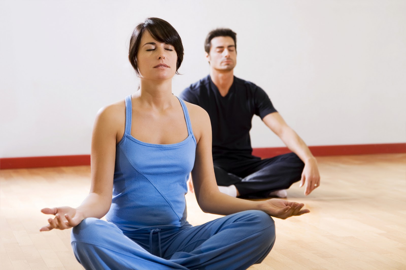 1363676645Yoga man and woman1